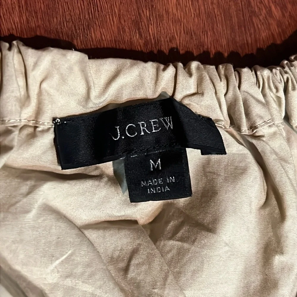 size medium tan j. crew blouse with tie detail